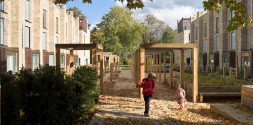 An illustrative image of a young family playing in a communal residential courtyard.
The map shows routes around Northampton between different residential areas, showcasing points of interest around the town.
There are interactive map markers which show illustrative photographs of how these areas could look.